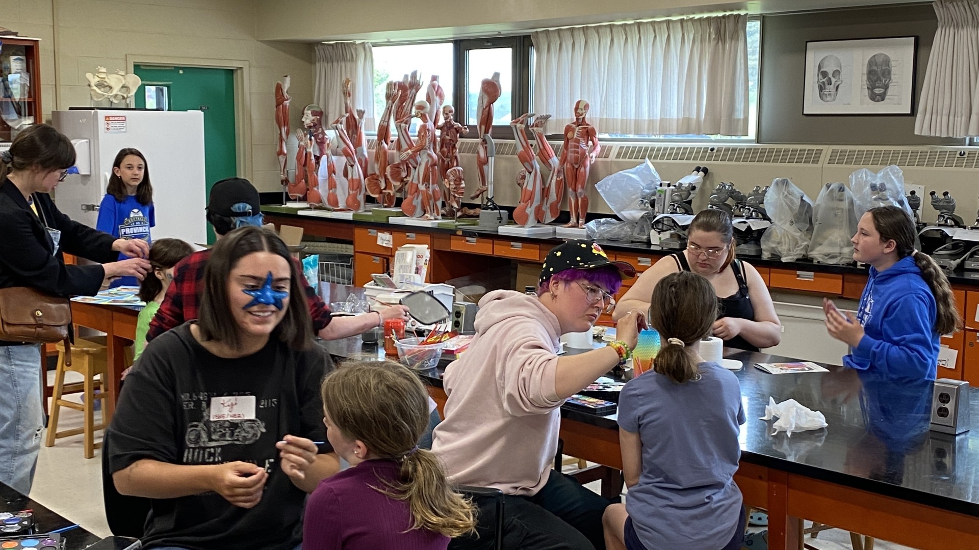 People doing activities on World Oceans Day 2024