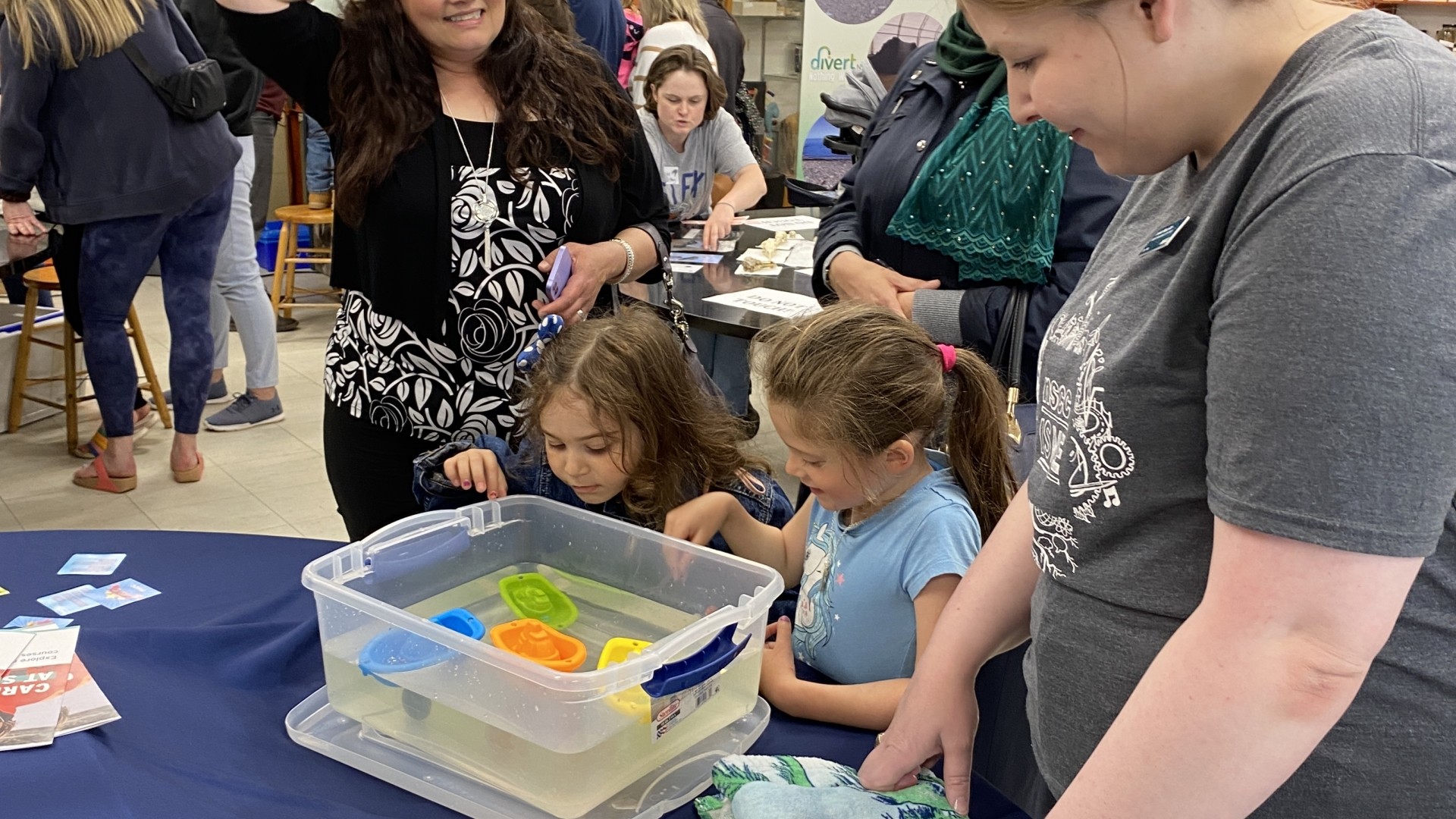 Children doing an activity at World Oceans Day 2024