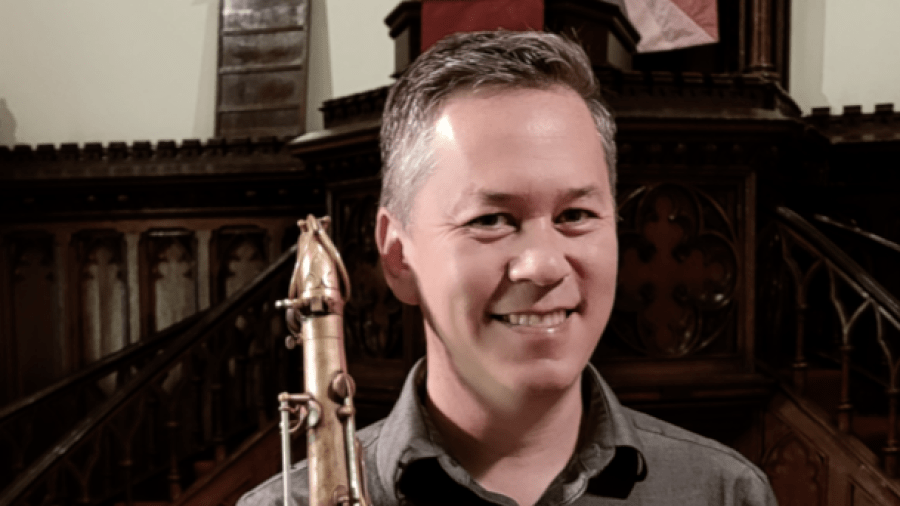 Headshot of Kenji Omae