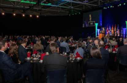 Viewers sitting at tables during the Atlantic Economic Forum
