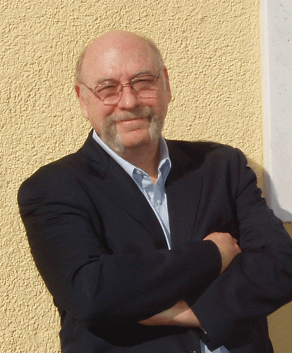 Portrait of Hugh Silverman wearing a suit